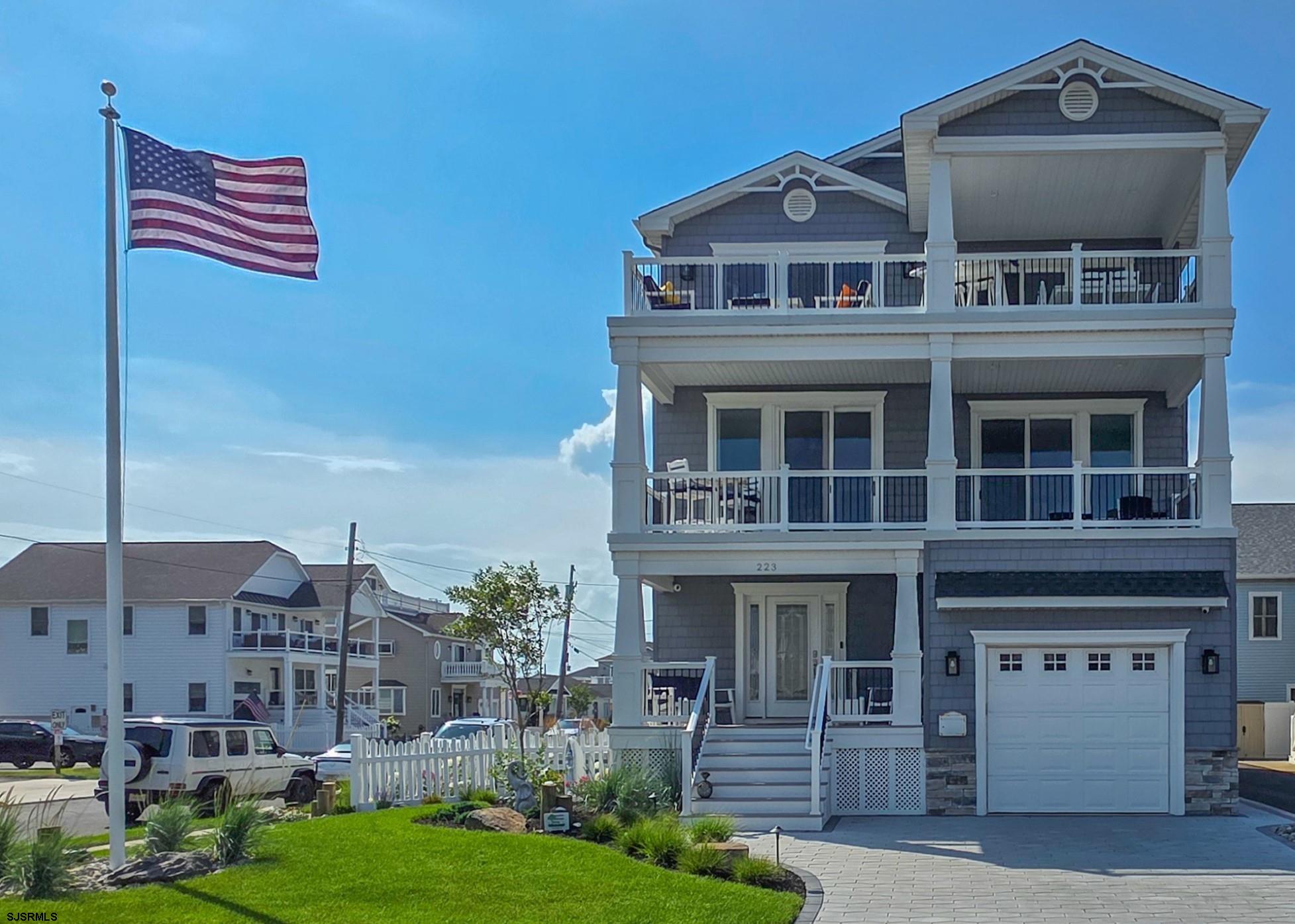 Ocean views from every floor. This 5 Bedrm, 4 Full Bath home was custom built by Woerner Builders in 2021 with every added feature, is just 79 steps to the Beach. The 3rd floor Living area features Breathtaking Ocean views, an Abundance of Granite Counterspace, an extra-large Center Island, Dining Area with Ocean Views, Gas Fireplace and an Oversized Deck with Gas Grill Connection. All accessed by a 4 stop elevator that takes you to all floors and the garage. GE Café appliances, Wine Fridge, and Under Counter Ice Machine. Plenty of Cabinet Space with pull out shelves and a Butler’s Pantry. The master Suite is Ocean Front on the 2nd fl with a gas fireplace and an oversized deck.  2 of the bedrooms have ensuite baths. The first floor features a sitting area, 2 bedrooms and a full bath. Garage with Resin floor, custom cabinets and 3 Bike Lifts. Fenced yard with a Paver Patio Sitting Area, Cameras, Sprinkler System, Outdoor Lightscaping and an Outside Shower make this the Ultimate Beach House.