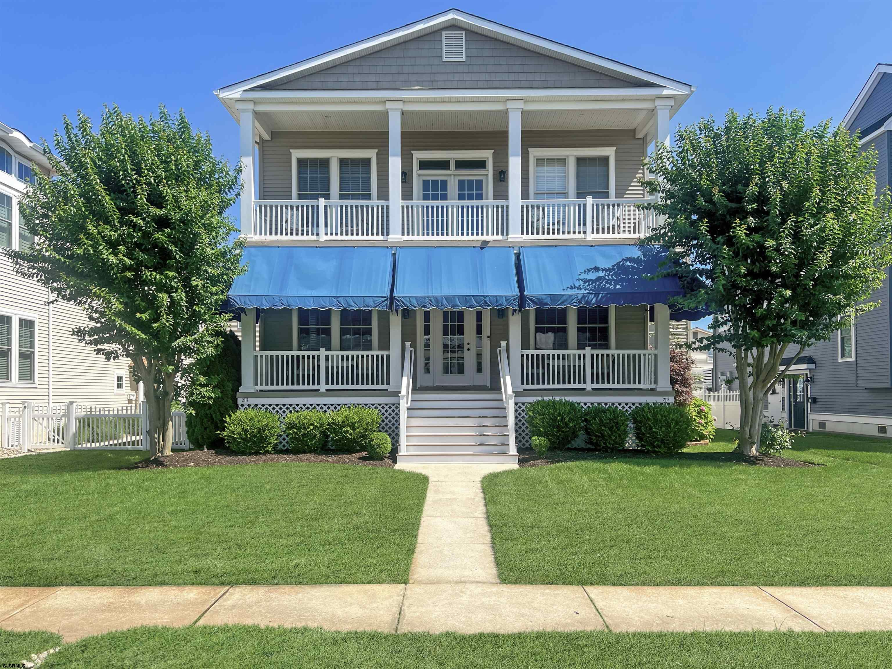 Located on a quiet and desirable street, this beautifully updated and fully furnished first-floor condo offers the space, layout, and convenience that can be hard to come by at the shore. Set on an oversized 60x115 lot, the property includes 4 large bedrooms, 3 full bathrooms, wide hallways, and generous closet and storage space throughout. The ground level foyer provides interior access to the attached garage, a private shower for rinsing off after the beach, and elevator access directly to the unit.  Upstairs, the great room features high ceilings, gas fireplace, and plenty of windows. Connected to the living space, the kitchen offers stainless steel appliances, a large island, beautiful countertops and backsplash, and a dining area that’s perfect for gathering with family and friends.  The spacious primary suite is complete with an attached bathroom, and two additional bedrooms function as junior suites with their own ensuites -ideal for guests or extended family. The fourth bedroom opens to a private deck, offering a quiet spot to relax.  Enjoy peaceful living with easy access to the beach, boardwalk, and all that Ocean City has to offer. With off street parking for two cars, an attached garage, updated finishes throughout, and a flexible, family friendly layout, this home is ready for its new owners!