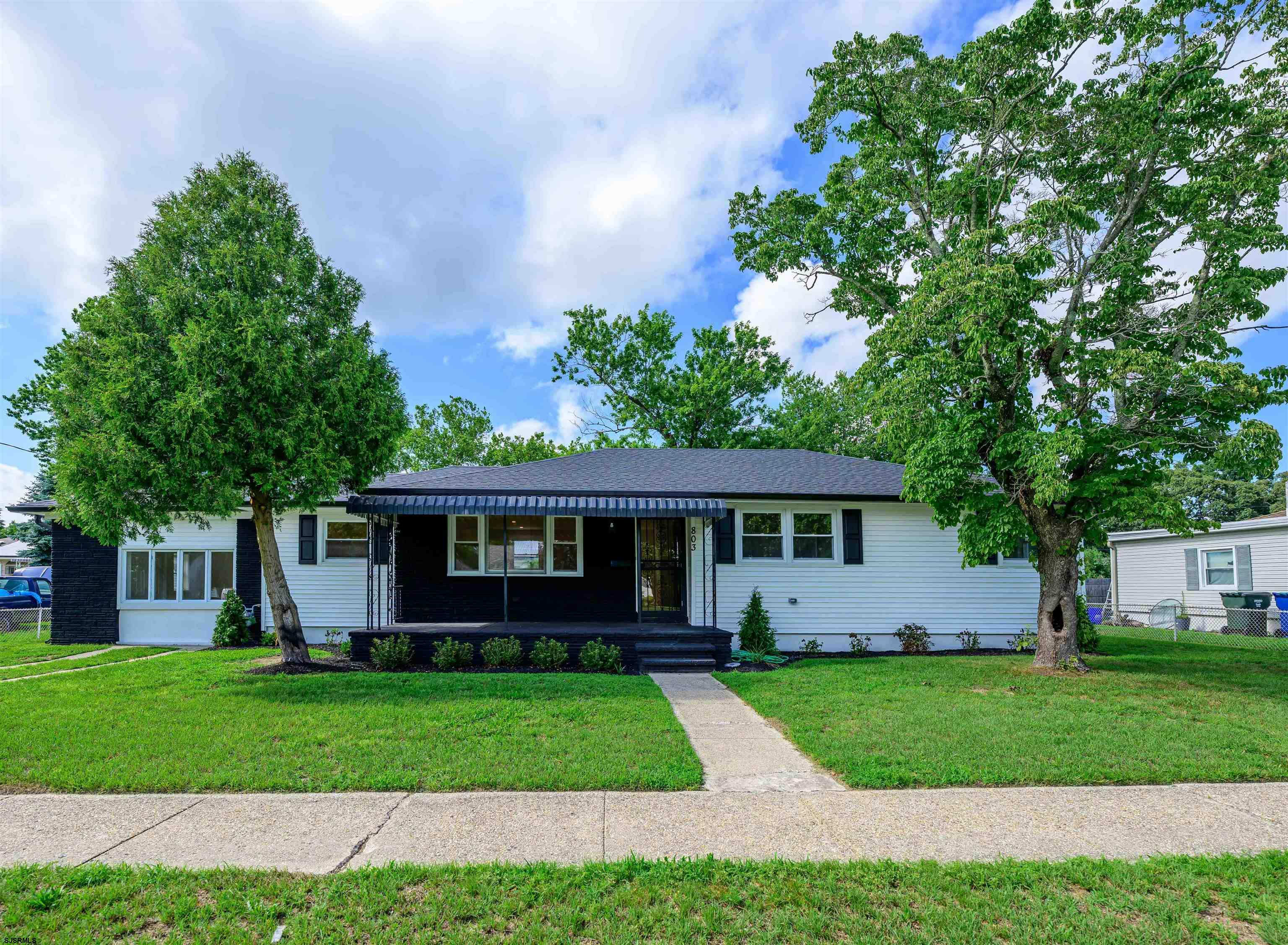 This beautifully updated 4-bedroom, 2.5-bath home offers modern design, flexible living space, and high-end finishes throughout. Located in a sought-after Northfield neighborhood, it features a private in-law suite with separate entrance and spa-style bathroom — ideal for multigenerational living, guests, or extended stays. Step inside to an open-concept layout filled with natural light. The home showcases a brand new 2025 roof, new gutters, and brand new vinyl siding. Interior upgrades include waterproof vinyl flooring throughout, solid core interior doors, and spacious living and dining areas designed for both comfort and entertaining. The heart of the home is the chef’s kitchen, complete with custom white shaker cabinetry, quartz countertops, and all-new stainless steel appliances backed by a 1-year manufacturer warranty. Enjoy the outdoors in the oversized backyard, offering more than enough space for a future pool or personalized outdoor retreat. All of this is set on a quiet street just minutes from top-rated schools, the Garden State Parkway, and the Jersey Shore. Key Features:  • 4 Bedrooms / 2.5 Bathrooms  • Private In-Law Suite with Separate Entrance  • Brand New 2025 Roof, Gutters & Vinyl Siding  • Designer Kitchen with Quartz Counters & New Appliances  • Waterproof Vinyl Flooring Throughout  • Solid Core Interior Doors  • Oversized Backyard – Pool-Ready  • Prime Location Near Schools, Parkway & Shore Turnkey and move-in ready — this exceptional home won’t last. Schedule your private showing today!