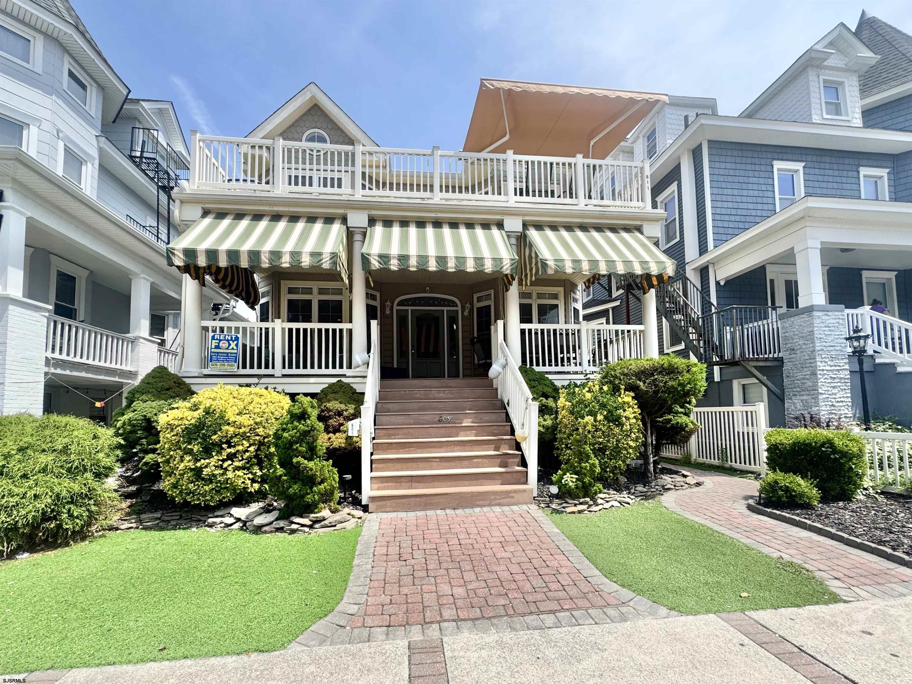 Beach Block Beauty! Spacious and well-maintained 4 bedroom, 2.5 bath condo located just steps from the beach in a highly desirable location. Enjoy morning coffee or evening meals on the front deck with a peek of the ocean. The open-concept living room, dining area, and kitchen offer plenty of space for family gatherings and entertaining.  Thoughtful layout includes: Rear primary bedroom with ensuite full bath Two middle bedrooms connected by a Jack & Jill half bath Additional full hall bath and enclosed outside shower for added convenience Four nicely sized bedrooms perfect for family and guests  Ideal for personal use or as a rental investment — no 2026 rentals booked yet, but several 2025 tenants are eager to return.  Don’t miss this opportunity to own a move-in-ready beach block property, priced to sell and sure to go quickly. Schedule your showing today!
