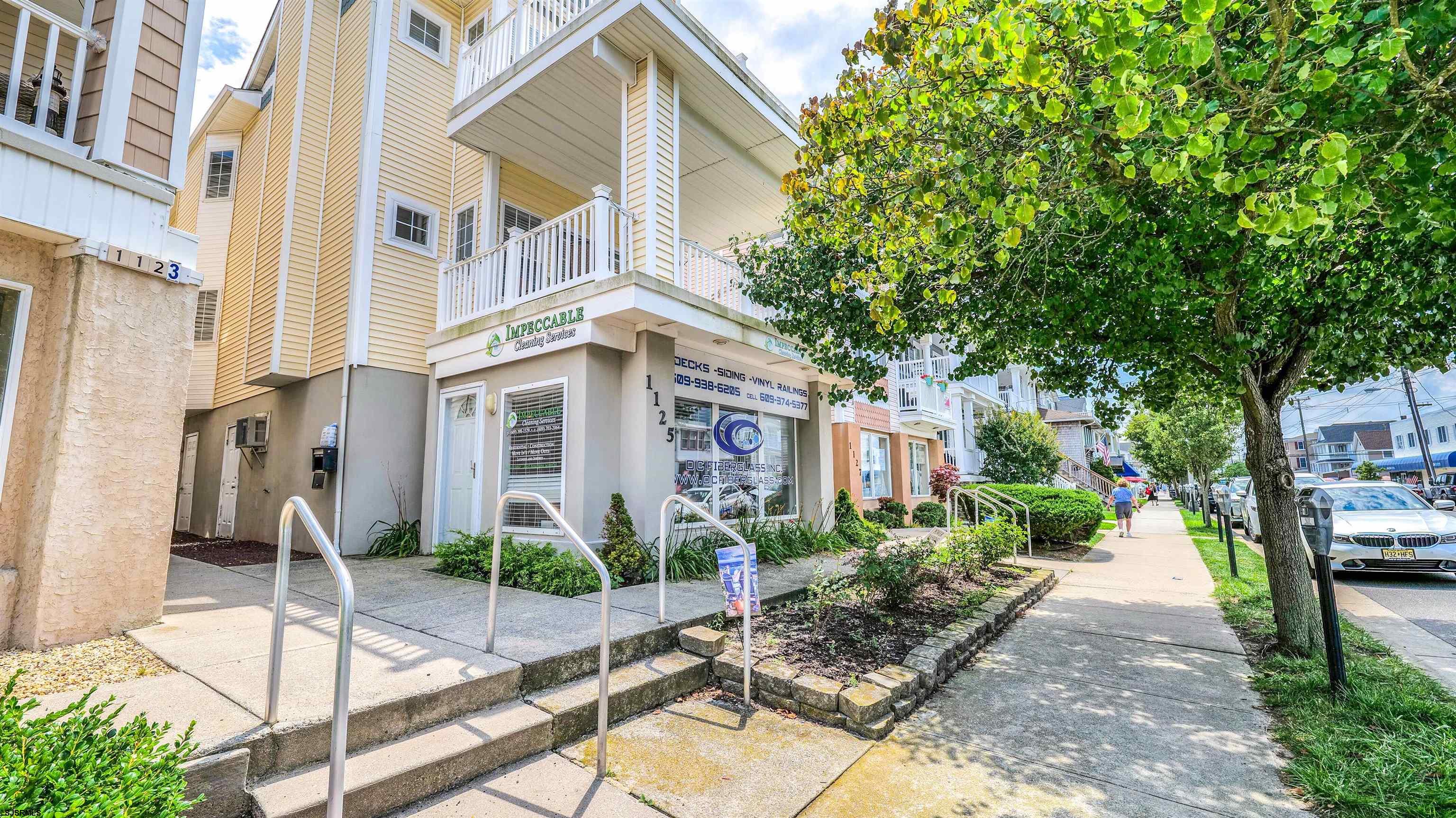 Welcome to 1125 Asbury Avenue, Unit B — a beautifully maintained 3-bedroom, 2-bathroom second-floor condo in the heart of Ocean City. Perfectly positioned near boutiques, dining, and the beach/boardwalk, this home offers a true Shore lifestyle. Enjoy relaxing mornings and breezy evenings on the spacious covered front porch overlooking the tree-lined Asbury Avenue. Inside, you’ll find an open-concept living, dining, and kitchen area with stainless steel appliances, granite countertops, and plenty of natural light. Additional features include a rear deck, private one-car garage, off-street parking for an additional car, outdoor shower, newer hot water heater, central air, and gas heat. This property also boasts a strong rental history, making it an excellent opportunity for both personal enjoyment and investment potential. Whether you’re seeking a year-round residence, vacation getaway, or income-producing property, this turnkey condo is offered mostly furnished, ready for you to move right in and start enjoying everything Ocean City has to offer. Showings begin Sunday, August 10th.