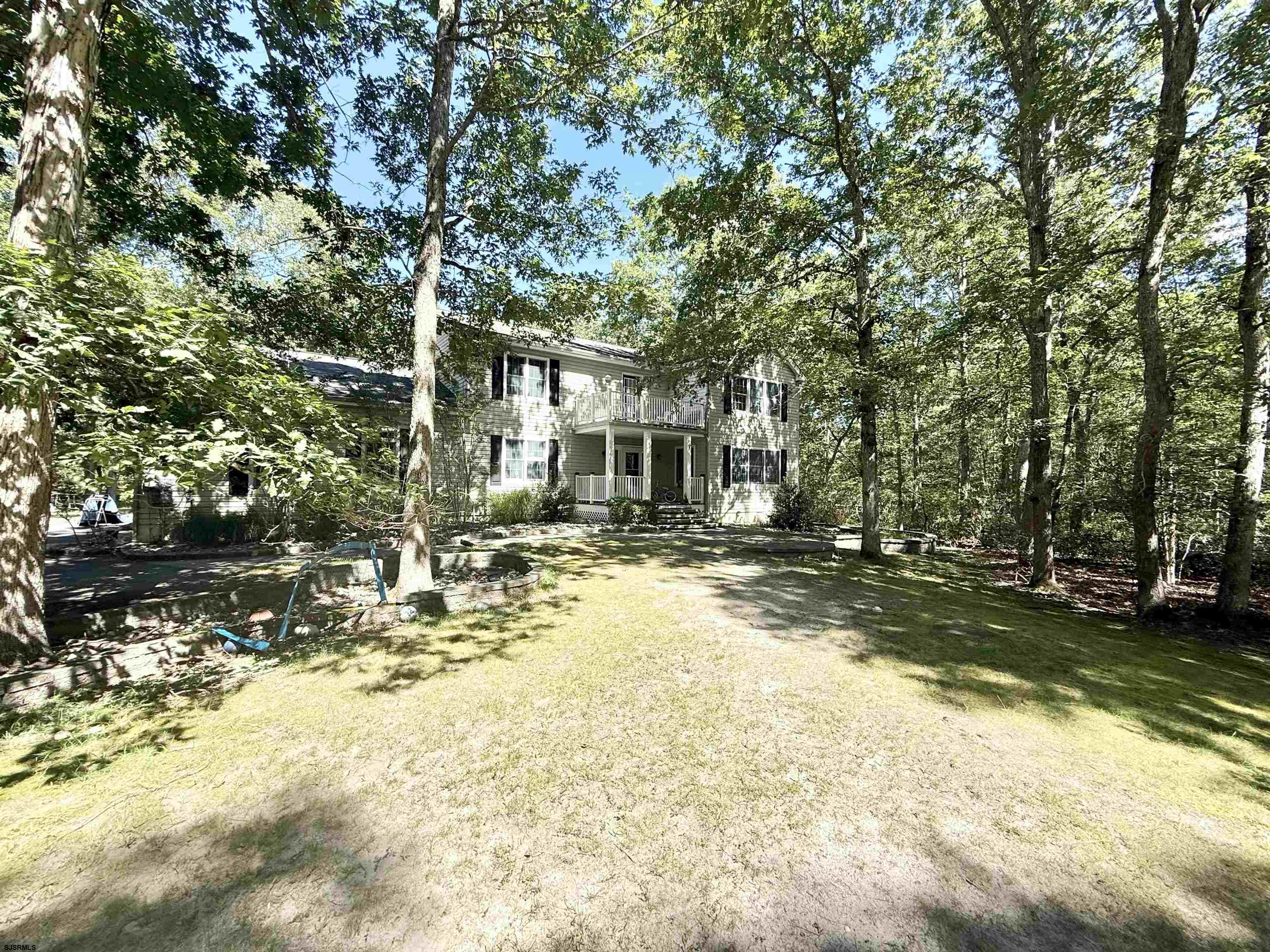 *******WELCOME HOME TO LAURELDALE LOCATED ON A SECLUDED AND PEACEFUL DEAD-END STREET SITUATED FAR OFF THE ROAD ON 4.86 PRISTINE ACRES. YOU WILL BE HAPPY TO COME HOME TO THIS PRIVATE OASIS W/ ALL THAT NATURE HAS TO OFFER!  THIS CUSTOM-BUILT 2 STORY HOME IS EXACTLY WHAT BUYERS WANT IN TODAYS MARKET W/ LOW INVENTORY! JUST MINUTES FR AC EXPRESSWAY AND SHOPPING! MASSIVE FAMILY ROOM W/ GAS FIREPLACE, LARGE COUNTRY KITCHEN IDEAL FOR THE CHEF! FORMAL DINING ROOM READY FOR THE HOLIDAY FEAST! BONUS ROOM ON 2ND PERFECT FOR EXERCISE ROOM, GATHERING ROOM OR PLAYROOM FOR THE KIDS! SEPARATE LAUNDY ROOM CONVENIENTLY LOCATED  ON 2ND  FLOOR RUN DO NOT WALK TO THIS ONE! GREAT OPEN FLOORPLAN W/ GUEST BEDROOMS THE SIZE OF MANY PRIMARY BEDROOMS. BRING THE WHOLE GANG HOME-THIS HUGE 5 BEDROOM 3 FULL BATH 2 STORY BOASTS 3652 SQ FEET AND CHECKS ALL THE BOXES. A TON OF SQUARE FOOTAGE FOR THE MONEY. YOUR DREAM WALK IN WARDROBE ROOM INC. HIS N HERS WALK IN CLOSETS  SUPERSIZED ROOMS THROUGHOUT WITH COMFORTABLE SPACE FOR EVERYONE INCLUDING EXTENDED FAMILIES. YOUR SEARCH IS OVER IF YOU DESIRE   ACREAGE , PRIVACY, HUGE BEDROOMS, OPEN LAYOUT, PLUS A BONUS SUNROOM. 3 BEDROOMS UPSTAIRS 2 BEDROOMS DOWN. A RARE & VERY POPULAR NOT ONE BUT 2 FIRST FLOOR BEDROOMS WITH A FULL BATH PERFECT FOR THE ELDERLY OR MAIN FLOOR GUESTS!  COVERED FRONT PORCH AND MULTIPLE DECKS IDEAL FOR OUTSIDE SPACE. LONG BLACKTOP DRIVE WITH AN EZ TO NAVIGATE U SHAPED DRIVE. SIDE LOADED GARAGE. PLENTY OF ROOM TO PARK YOUR VEHICLES, RV’S AND TOYS. ROOM TO ROAM IN A TRANQUIL PARK LIKE SETTING. SPACIOUS BACKYARD W/ FLORIDA ROOM LEADING TO A BEAUTIFUL TREX TYPE DECK SURROUNDING A SWIMMING POOL  THIS ONE GUARANTEED WONT LAST EZ TO SHOW W/ NOTICE W/ THE SUBJ TO SELLERS FINDING SUITABLE HOUSING BUT WILL AGGRESSIVELY SEARCH.SELLING AS IS BUYER RESPONSIBLE FOR ALL INSPECTIONS, CERTIFICATIONS AND CO. SEPTIC WELL MAINTAINED AND PASSED IN INSPECTIONS 2020. AS IS HOWEVER, THE HOUSE APPEARS TO BE IN VERY GOOD CONDITION. THE RED SHED IS EXCLUDED FR SALE. EZ TO SHOW W/ NOTICE.
