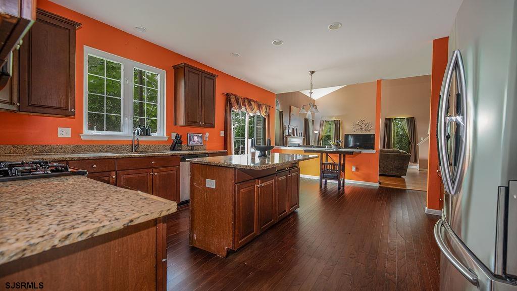 *MAJOR PRICE REDUCTION* Welcome to this beautifully maintained 3,015 SQFT home tucked away in the quiet, Cedar Point community of Mays Landing. With 4 bedrooms, 2.5 bathrooms, a home office, formal living room, spacious family room with a cozy gas fireplace, dual staircases, a full basement, and a 2-car garage, this residence offers both functionality and comfort. Inside, you’ll find hardwood floors, 9-foot ceilings, and a gourmet kitchen with granite countertops, 42” cherry cabinetry, stainless steel appliances, and a center island. The luxurious primary suite features a walk-in closet, dual vanities, a jetted soaking tub, and a custom shower, while the second full bath also includes dual vanities for added convenience. Step outside to your private backyard retreat—complete with a paver patio that lights up at night, a custom-built fire pit, and a shed for extra storage. Located just minutes from local restaurants, shopping, schools, Atlantic City, the Garden State Parkway, and the Jersey Shore, this home combines style, space, and community. Schedule your private showing today!