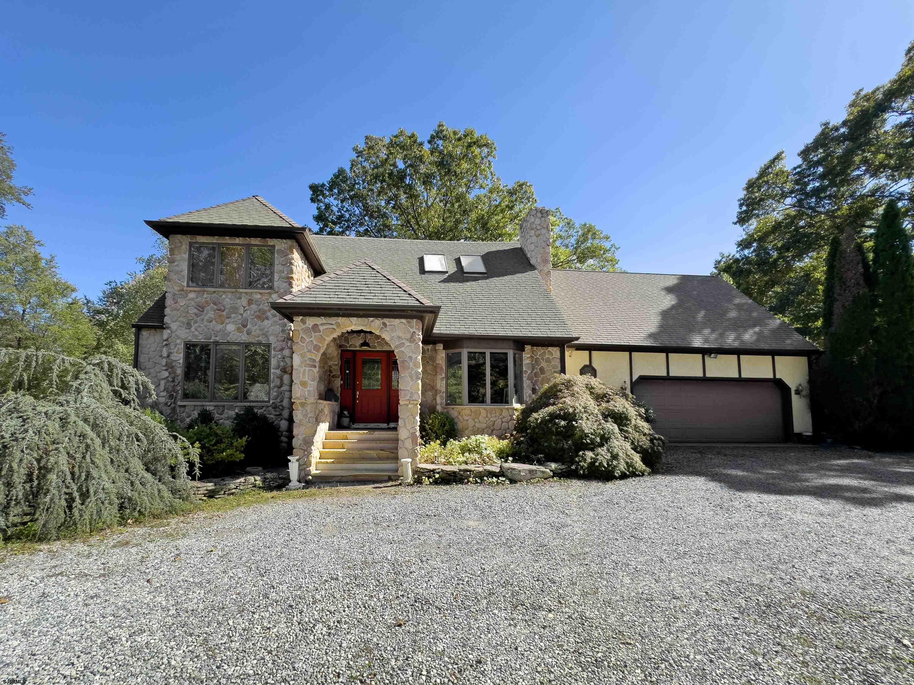 Discover a truly unique property at 2614 Cologne Ave! Set on nearly 2 acres, this expansive 5-bedroom, 6-bath estate (four full and two half baths) offers over 3,600 sq. ft. of living space designed for comfort, functionality, and endless possibilities. Step inside to find a spacious kitchen with a center island that flows into a dining room accented by built-in china closets. The first floor also features two versatile bedrooms (or an ideal home office setup), a full bath, and a bright great room with skylights and sweeping views of the beautifully landscaped yard and pool. A large laundry room with counters and storage, along with a convenient half bath, adds to the thoughtful layout. The 2½-car garage includes a full kitchen and storage, while multiple brick patios provide inviting outdoor areas for relaxing.  Upstairs, the spacious primary suite features skylights, two cedar closets, a large walk-in closet, and a private bath with a jacuzzi tub, laundry chute, and space to complete a double shower. Two additional bedrooms, extra storage, and a walk-up attic complete this level. Above the detached workshop, a finished apartment with a full kitchen and bath offers flexibility for in-laws or extended family. The expansive workshop/garage area includes two smaller bays, an 18’ bay, a loading dock, and a half bath—perfect for contractors, business owners, or hobbyists in need of serious workspace.  The grounds are a true retreat, featuring an inviting inground pool, gazebo with electric, and vibrant flower beds throughout. A dog pen with power, a large cement area with basketball hoop, outdoor street lighting, and three sprinkler systems complete this impressive property. Newly installed solar panels (2025) keep energy costs low with a fixed payment of just $187 per month. While it needs some updates, it offers incredible potential to restore and transform into a one-of-a-kind dream estate. Don’t miss this rare opportunity—2614 Cologne Ave is truly a property like no other