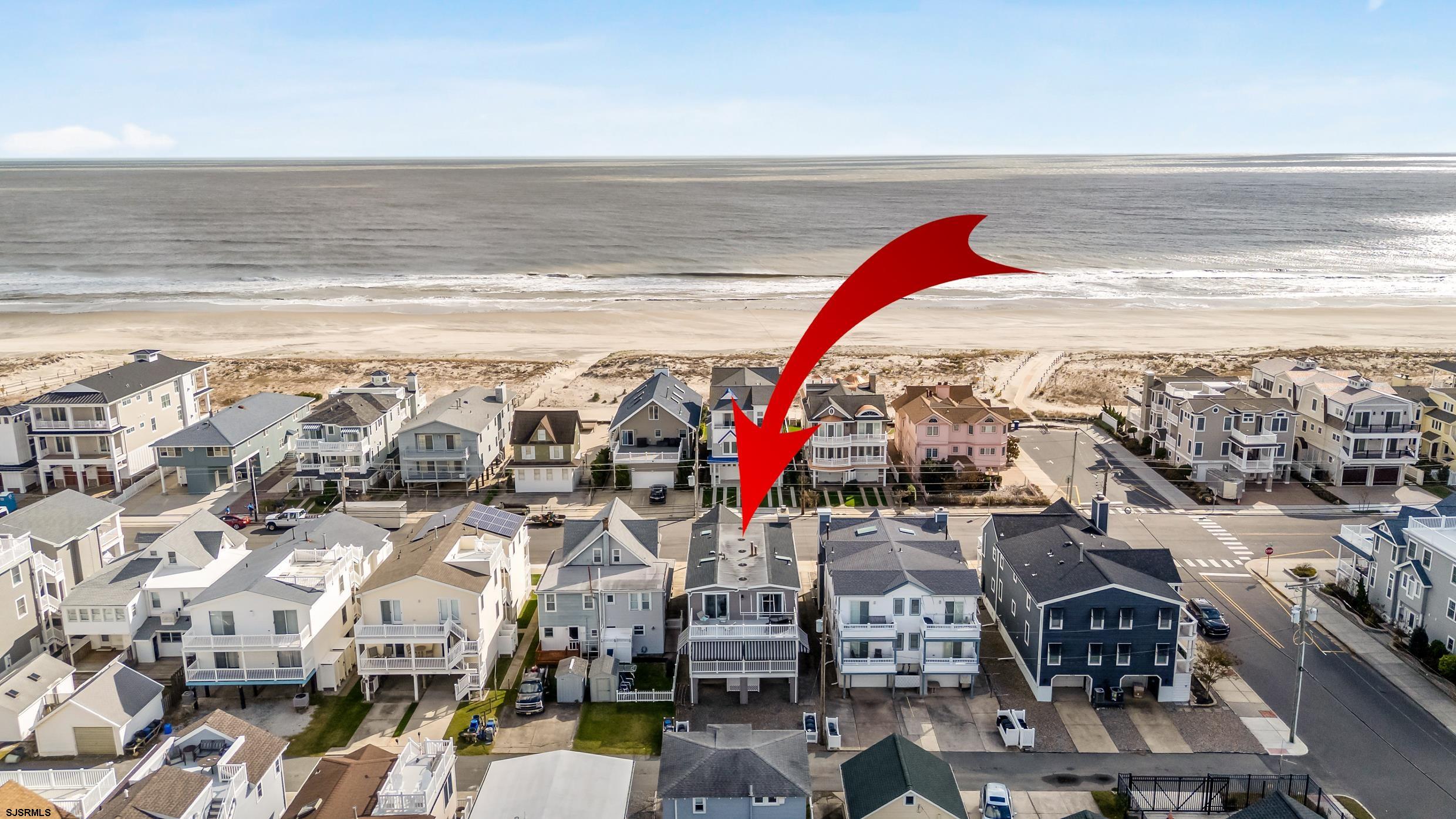 Welcome to your beachside retreat in Ocean City’s peaceful Southend! This spacious 2nd floor features 4 bedroom, 2 full-bath and has been thoughtfully updated and features a designer kitchen outfitted with premium GE Café appliances — blending  luxury and functionality just steps from the sand. Inside, enjoy an open-concept living space with fresh finishes, modern flooring, and abundant natural light. The gourmet kitchen boasts GE Café appliances, quartz countertops, huge center island, custom wood cabinetry — perfect for hosting summer dinners or cozy off-season meals. Each of the four bedrooms offers generous space and coastal charm, while both bathrooms have been tastefully renovated with contemporary fixtures. Step outside onto your private decks to enjoy water views over morning coffee surrounded by the sounds of the ocean. Highlights: • 4 spacious bedrooms, 2 full baths • Recently updated interior • Designer kitchen with GE Café appliances • Open-concept living and dining • Private decks for outdoor relaxation • Onsite parking for one car + garage • Outdoor enclosed shower — perfect after beach days • Prime Southend location — quiet, family-friendly, and just steps to the beach Take advantage of easy access to Ocean City’s wide beaches, scenic bike paths, and beloved local spots like Uncle Bill’s Pancake House. Whether it’s breakfast, lunch, dinner, or ice cream, summer conveniences are just a short stroll away. Whether you're seeking a seasonal escape, year-round living, or a smart investment, this condo delivers comfort, style, and unbeatable location!