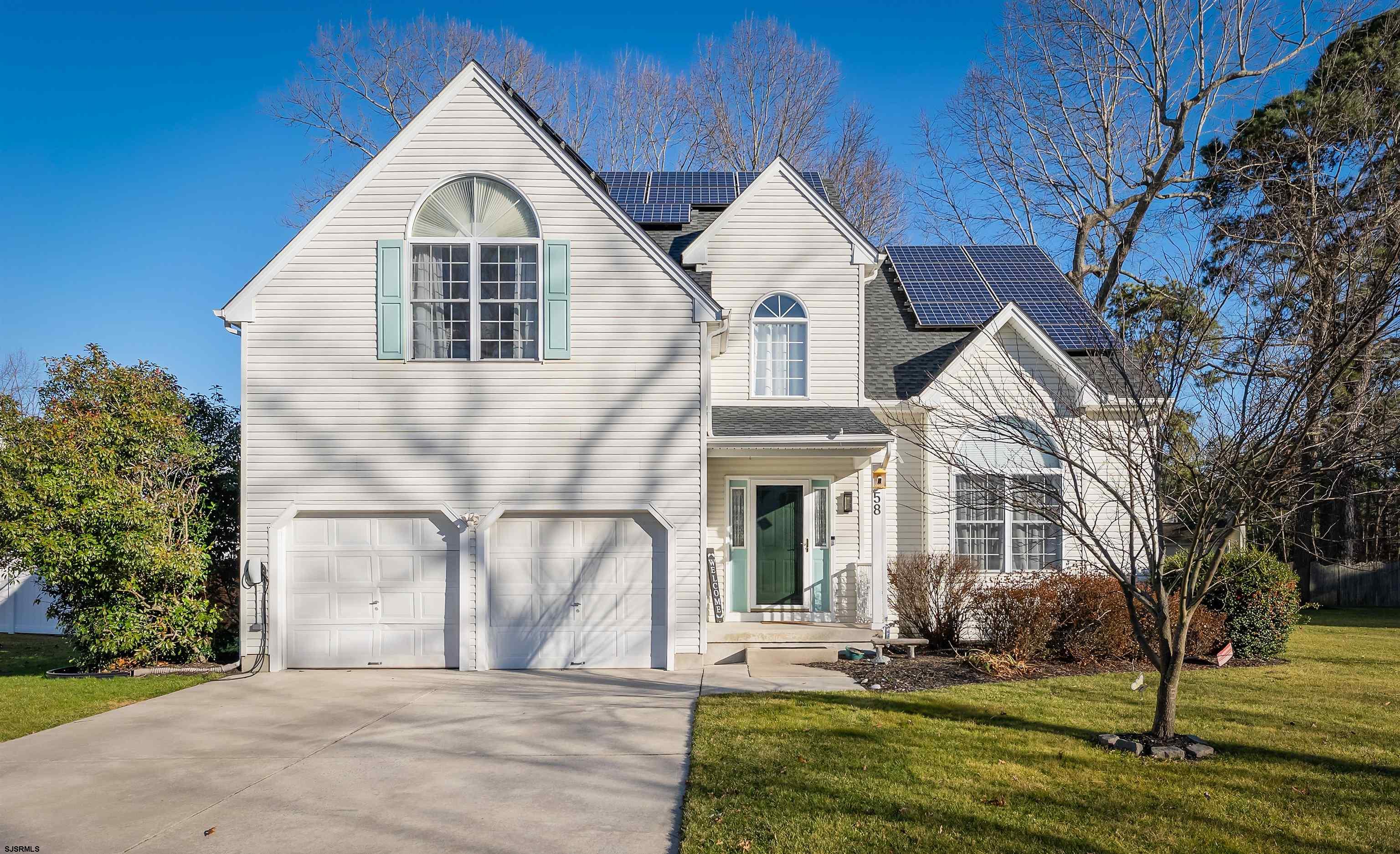 Nestled in a quiet neighborhood in Mays Landing, this contemporary two-story home offers a thoughtful layout, recent upgrades, and comfortable living spaces throughout. Step inside to a bright living room highlighted by vaulted ceilings, creating an open and welcoming atmosphere that flows easily into the spacious kitchen. The first floor also includes a dining room, laundry room, half bathroom, and direct access to the attached two-car garage.  The second floor features a generously sized primary bedroom with a walk-in closet and a well-appointed ensuite bathroom with a soaking tub and walk-in shower. Two additional bedrooms and another full bathroom complete the upper level.  Notable updates include a newer roof, updated heating and air conditioning systems, and water heater. The home also benefits from an owner-friendly solar lease.  Step outside to enjoy a private, fenced-in backyard with a patio and jacuzzi, providing a great space for relaxing or entertaining. Conveniently located close to shopping, dining, and everyday amenities, this home combines a peaceful residential setting with easy access to everything Mays Landing has to offer.