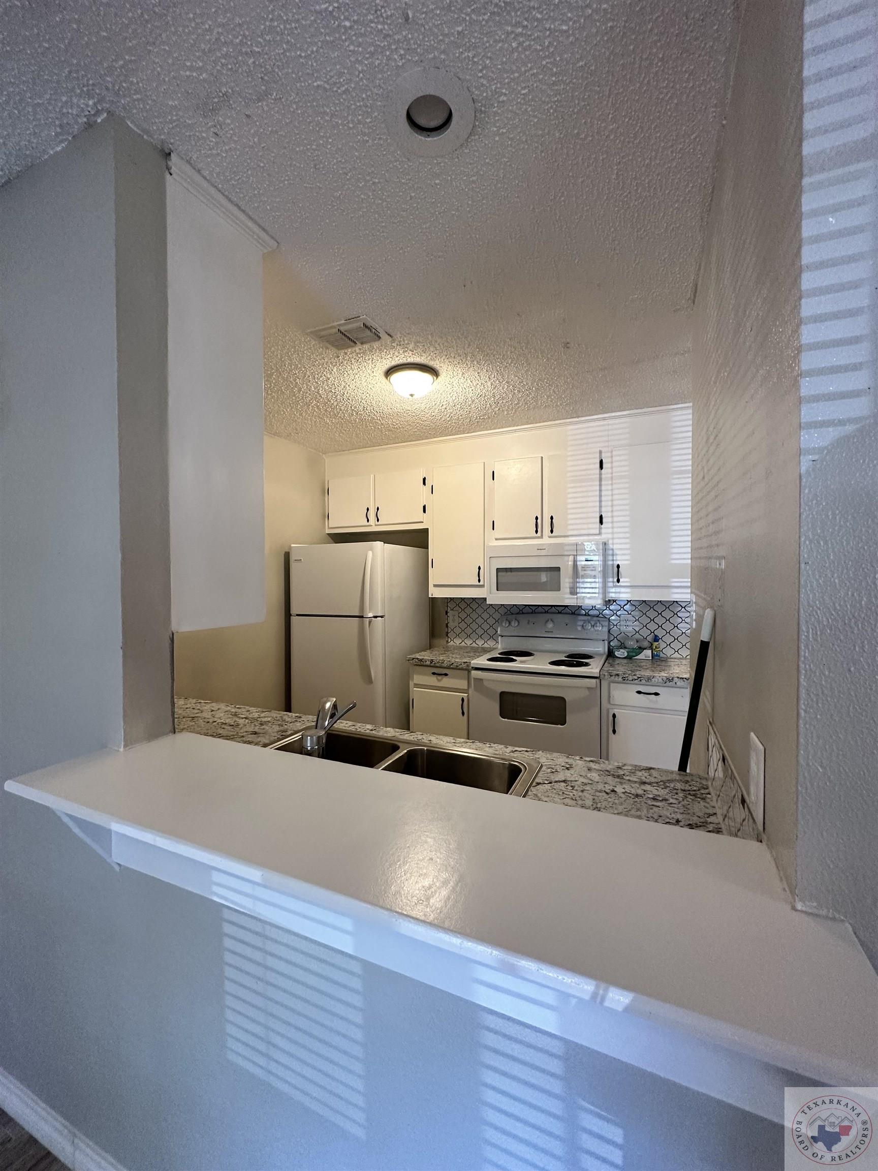 2313-2315 Grand Ave