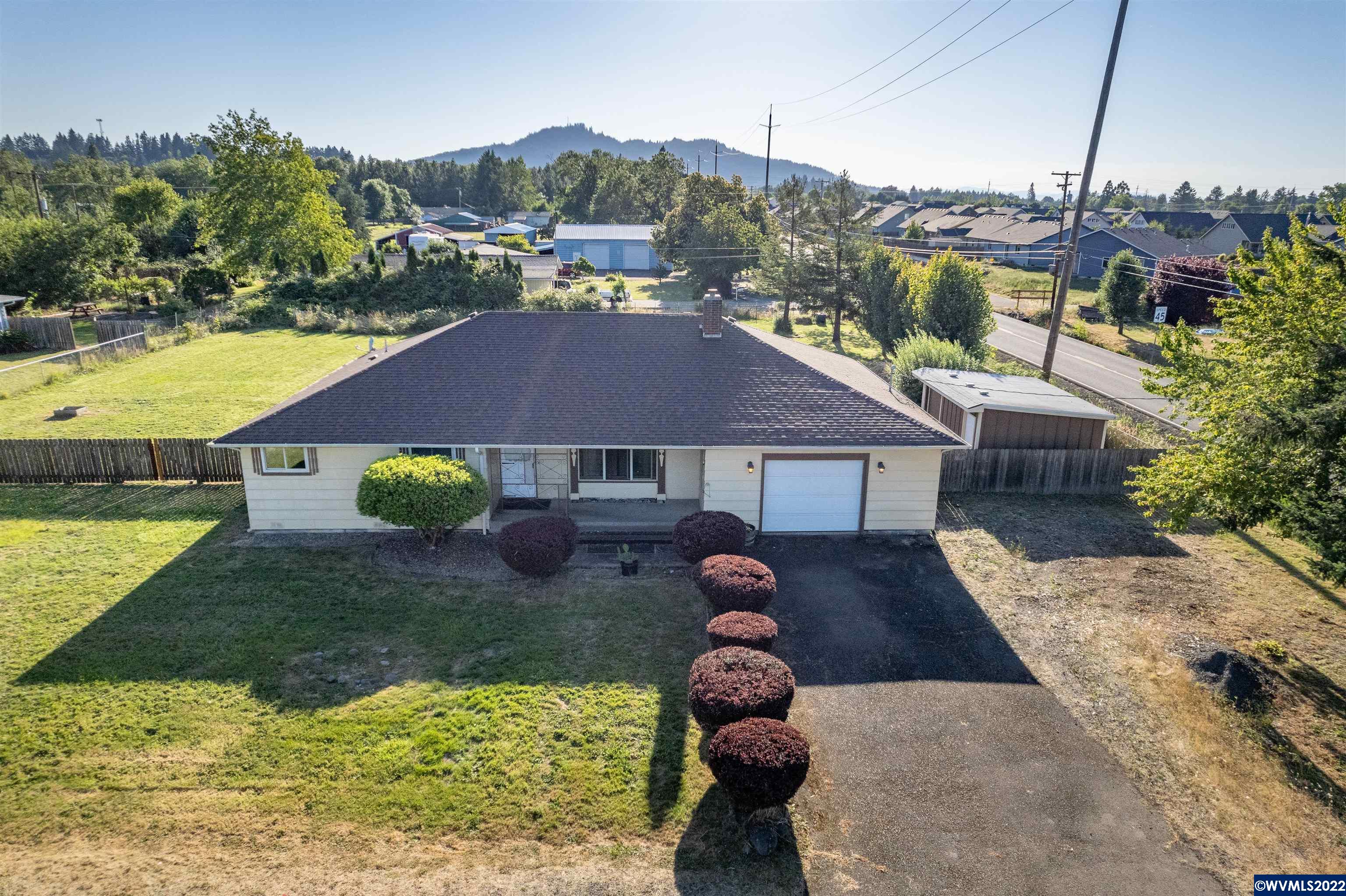 Single level spacious home located on corner lot. This 4 Bdr. 2 Bath home sits on over half an acre. Giant backyard has plenty of space for all your entertaining and outdoor-fun. Country feel but close to shopping and schools. Ready for new owners to make it their own.