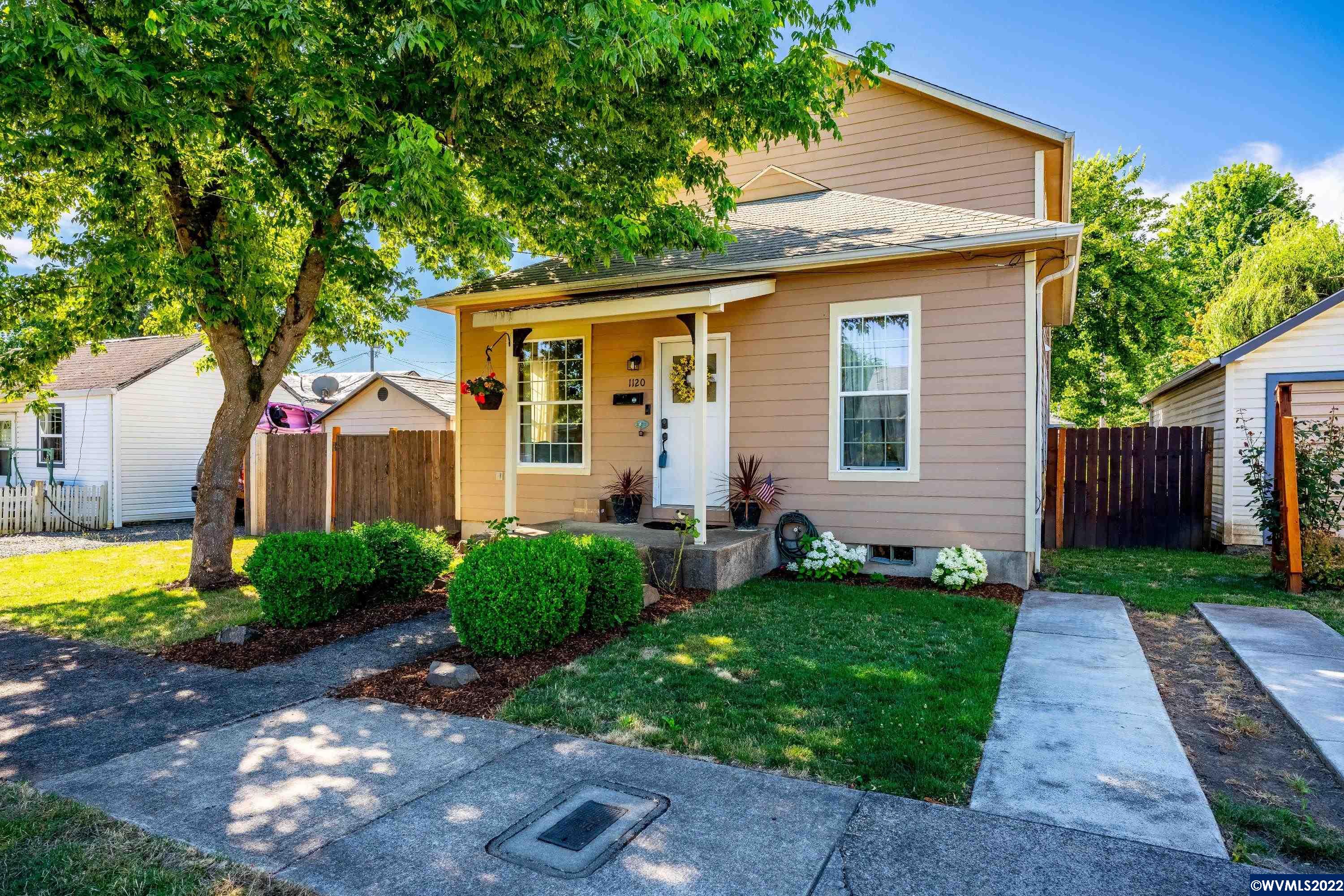 Historic Bungalow Charm meets modern day. Adorable 2 story home blocks  from Downtown Albany. Main level offers bright living/dining rm w/ tall ceilings and hard surface wood style flooring. Cozy kitchen/ s/s sink, oven, BI microwave. Laundry m. 2 bdrms and Pantry/mudrm leads out to deck, fenced backyard, lawn, 10x20 Shed/bonus rm. Upstairs are Lg Primary rm upstairs w/ full bathrm and 4th bdrm. Parking in Front driveway and back gated gravel area. Foundation, plumbing and electrical redone 2003.