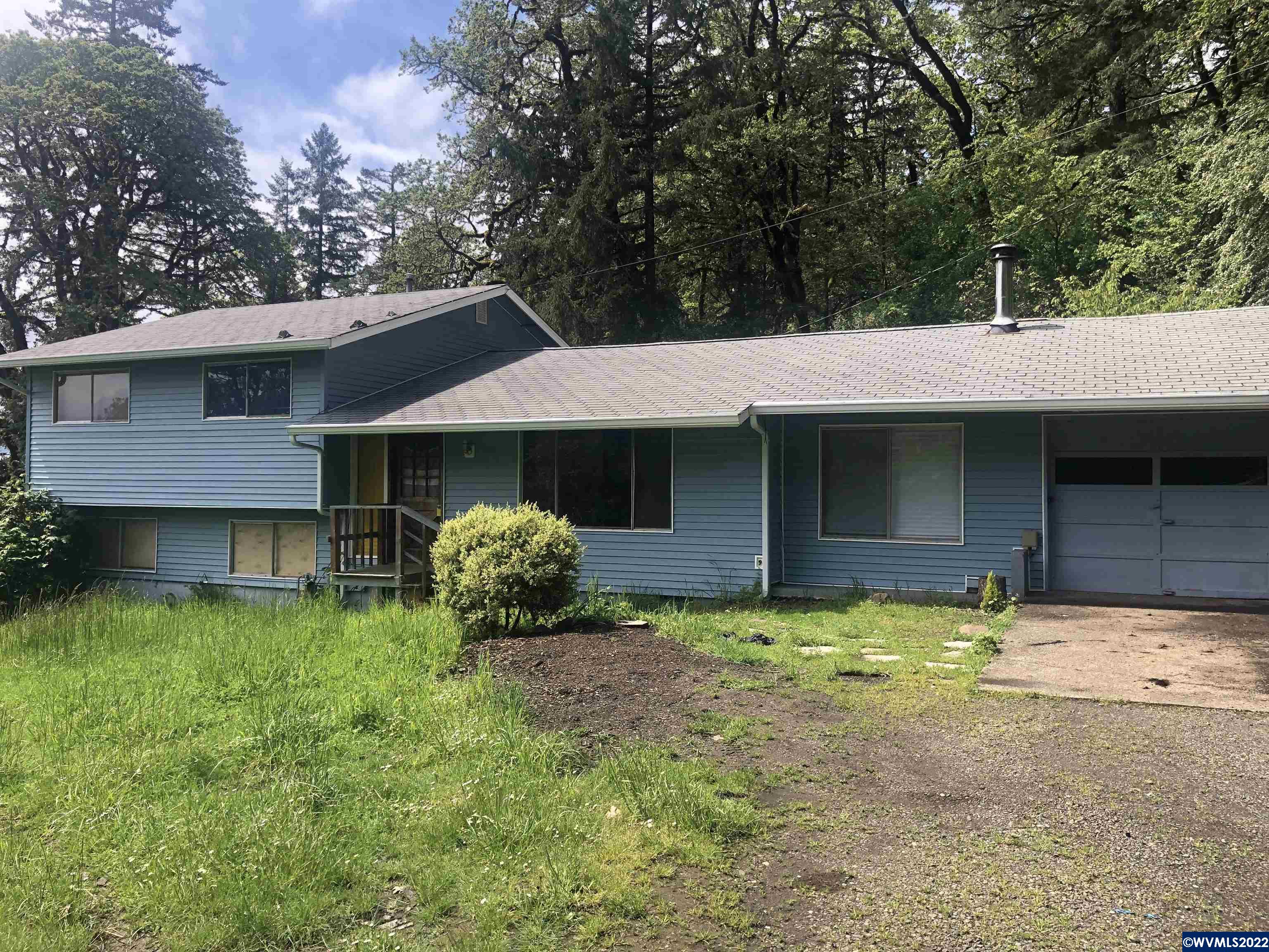 Hard to find small acreage property in North Corvallis. This one will need quite a bit of work but the location speaks for itself. Take a look and imagine the possibilities. Buyer to perform all due diligence in every aspect of the property.