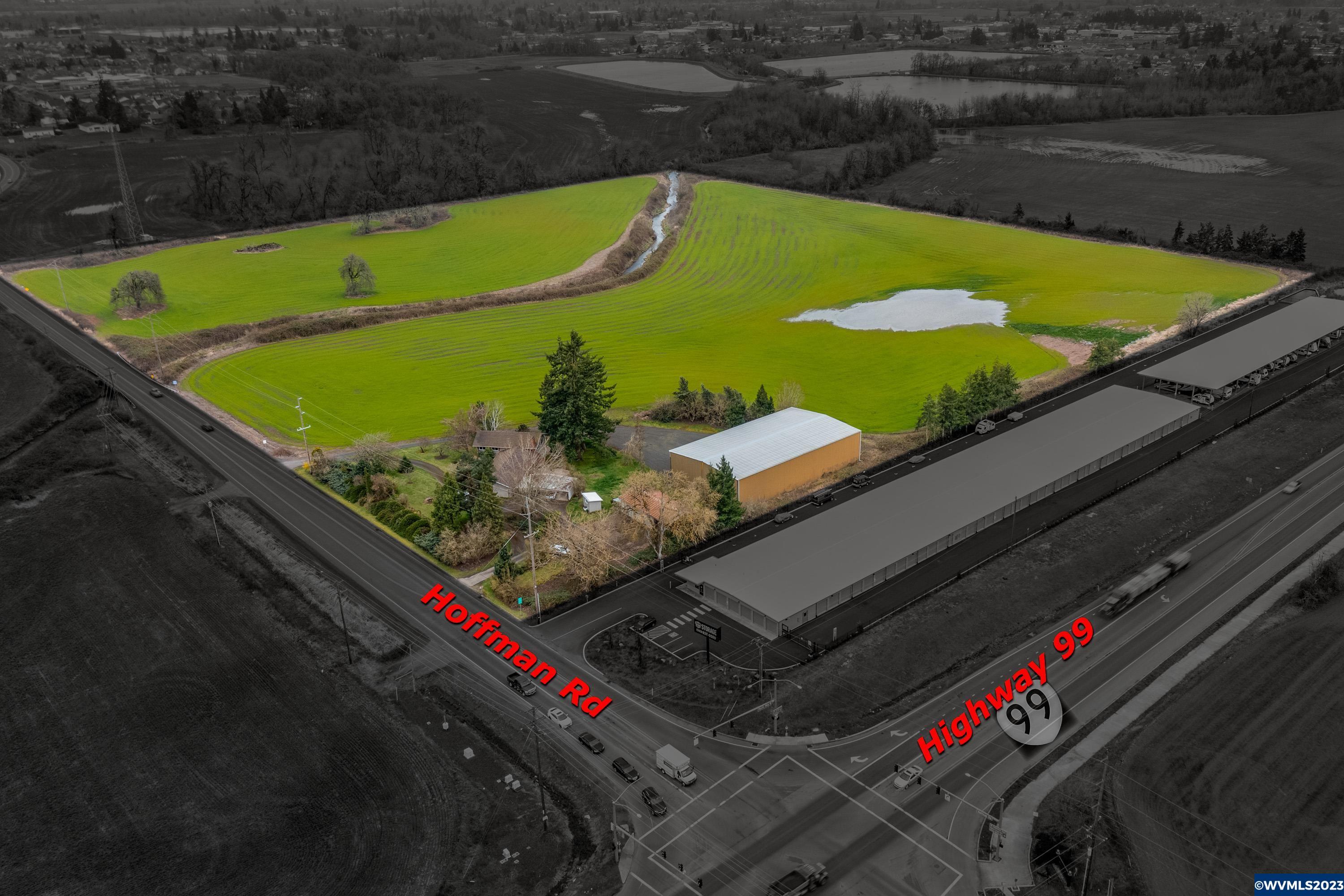 31.15 acres of prime development land. Located on Hoffman Rd one parcel away from 99W in Monmouth's growth boundary. Currently, zoned country industrial park. Well maintained 3051 sqft tri-story home built in 1970. Large 5 bay implement storage 125 x 70 and 50 x 25 shop.