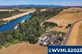 This beautiful 35.46 AC Riverfront property has 16.22 AC of tillable land 15. 65 w/water rights. Currently a working Nursery with over 16,000 SF of greenhouse space (able to be heated and irrigated) and a storefront w/parking. There are 2 homes on the property, an 1886 farmhouse, 3 bd/2ba, w/wood floors and was the former Peoria schoolhouse with lots of potential as well as a MH that could remain or be a potential build site. 12.43 AC fenced pasture was once used to raise cattle, currently in grass seed. *