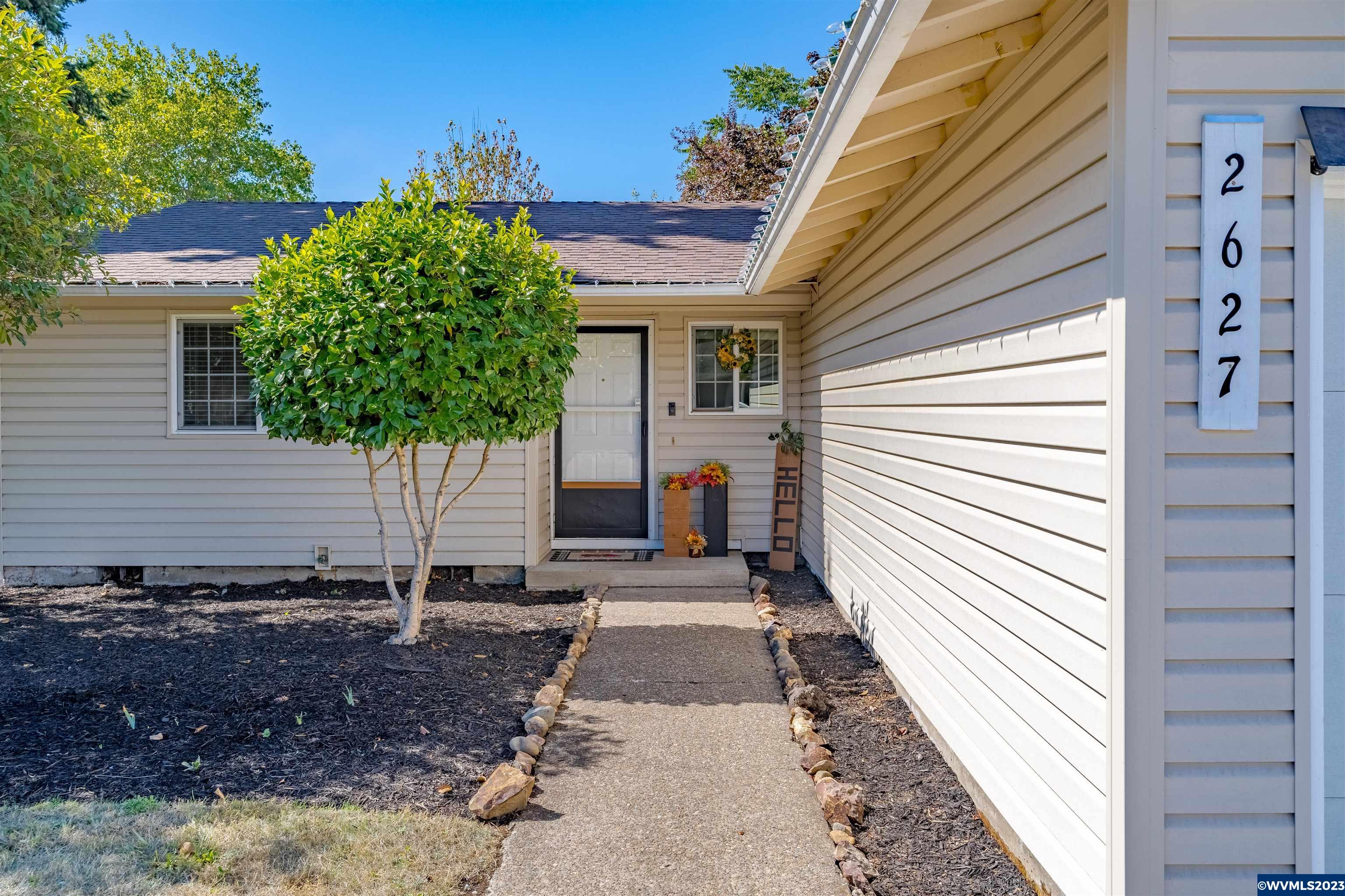 Look no further... This adorable 3/2 has been tastefully updated, and is ready for you to call it home! The spacious living room, and huge back yard are perfect for entertaining all your guests. Second full bath/laundry combo is just before the garage. Property features plenty of parking, with room for an RV, shed for all your storage needs, fruit trees for those yummy holiday pies, and much more. You're going to want to see this home before it's gone!