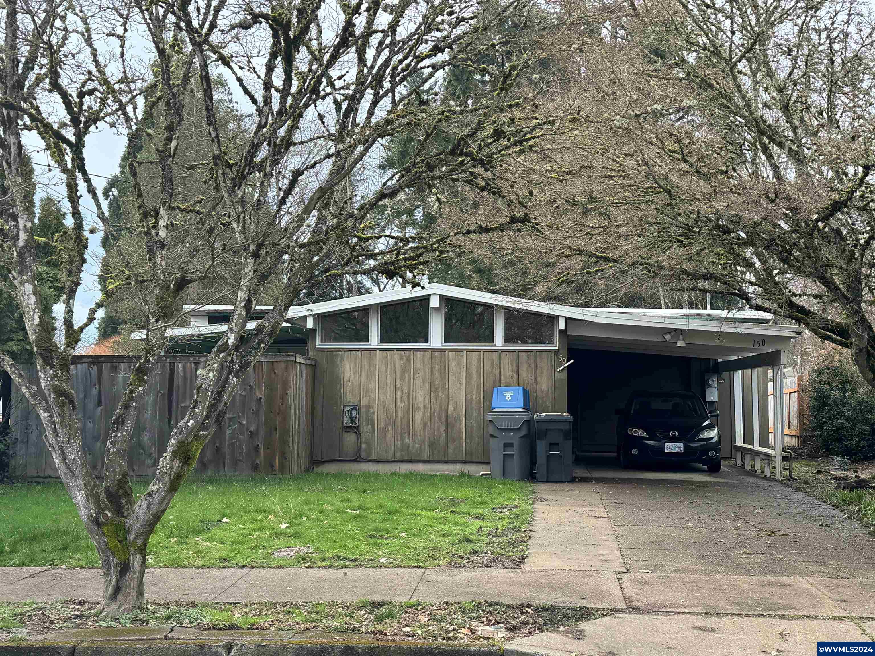 Great Single level 4 bedroom home close to downtown, golf and Campus. Excellent rental record or make it into your own Home! Includes plenty of parking  and large backyard for entertaining or put in your own ADU. Classic mid century open kitchen with high ceilings and plenty of light. Primary bedroom has its own full bath.