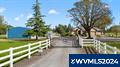 EQUESTRIAN PROPERTY FACILITY used for boarding & training on beautiful manicured 19 acres. Main stables w/60x144 indoor riding arena, 38x144 barn w/auto water has (8)12x14 matted stalls, (4)12x12 matted stalls, automatic waters, 24x24 storage, 12x12 wash rack, 12x29 tack room w/viewing area above, (3) get ready areas, steel frame, sand arena, (2) sliding doors at each end of barn, 11x144 cement isle way, additional 3 stall barn w/12x12 stalls has dry and grass paddocks, 13 paddocks w/5 dry paddocks have shelter/stalls w/isle ways to feed, 6 isle ways, 2 big fields, 65 ft round pen, seasonal creek and pond, 50x30 2 bay shop w/ industrial propane heater has 2 10 ft doors w/30x18 lean to. 48x30 4 12ft bays for hay storage and trailer storage, 36x38 detached 3 bay garage/shop w/upstairs office/recreation room, full bath room, kitchen, seating area, heat/AC, w/half bath down stairs great for boat storage. Home has open floor plan w/ vaulted great room, wood burning stone fireplace, kitchen has custom cabinets w/pull out drawers in pantry, stainless appliances, tile floors, island, eating bar, dining room w/built-ins, second sliding door w/views of tall oak trees & sunrises, primary is vaulted w/custom tall windows overlooking back yard & oak trees, heated tile floors, w/walk-in closet, jetted tub, double sinks, utility room w/built ins, covered back patio, attached 3 car garage w/hot & cold water, wired for surround sound inside and outside, 2 electrical panels, high speed internet, seller is a licensed broker.