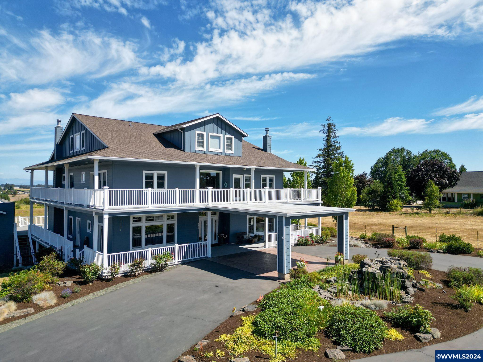 Welcome to this Luxurious Rural Home in Corvallis, Oregon close to shopping & dining. Discover unparalleled elegance at this 7.85 acre estate. With 5,300+ sqft across 3 levels, this stunning home features 6+beds & 6 baths, combining modern amenities with serene rural charm all within 6 min of the hospital or 10 to downtown. Step in to find sunlit living areas with large windows offering breathtaking views of The Coast & Cascade Ranges. On most days you can see Mt. Jefferson & The Three Sisters. Wake up with a sunrise coffee; end your day with a sunset glass of wine. Custom local cabinetry enhances style & function throughout the home. The chef's kitchen boasts granite & butcher block, SS appliances & walk-in pantry, perfect for culinary enthusiasts. The opulent primary suite is a true retreat, featuring a cozy sitting room, an adjacent nursery or office with a private balcony, en-suite bath with whirlpool soaker tub, rain shower & his/hers walk-in closet. Outdoor living is elevated with 2 wrap-around decks, a covered outdoor entertaining area & a tranquil water feature. Enter the home through the Portico making grocery drop off a breeze. Additional features include radiant heated tile floors, geo-thermal heating/AC & Audiosccess WHEN home theatre system. Enjoy active recreation on the 92' lighted sports court & benefit from the barn & cross-fenced pasture for added versatility. Car enthusiasts will love the 5600+ sqft shop, complete with a 4-post hoist, paint booth, welding room, RV hookups, indoor waterproof room for car washing or animal grooming, 4-10x14 ft doors & 1200 sqft loft for storage. An 800 sqft apartment(easy ability to add on) off the deck provides additional space for guests or dual living. Whether you're seeking a peaceful retreat or a space to entertain, this property offers the best of both worlds in beautiful Corvallis. Don't miss the chance to own this exceptional estate.