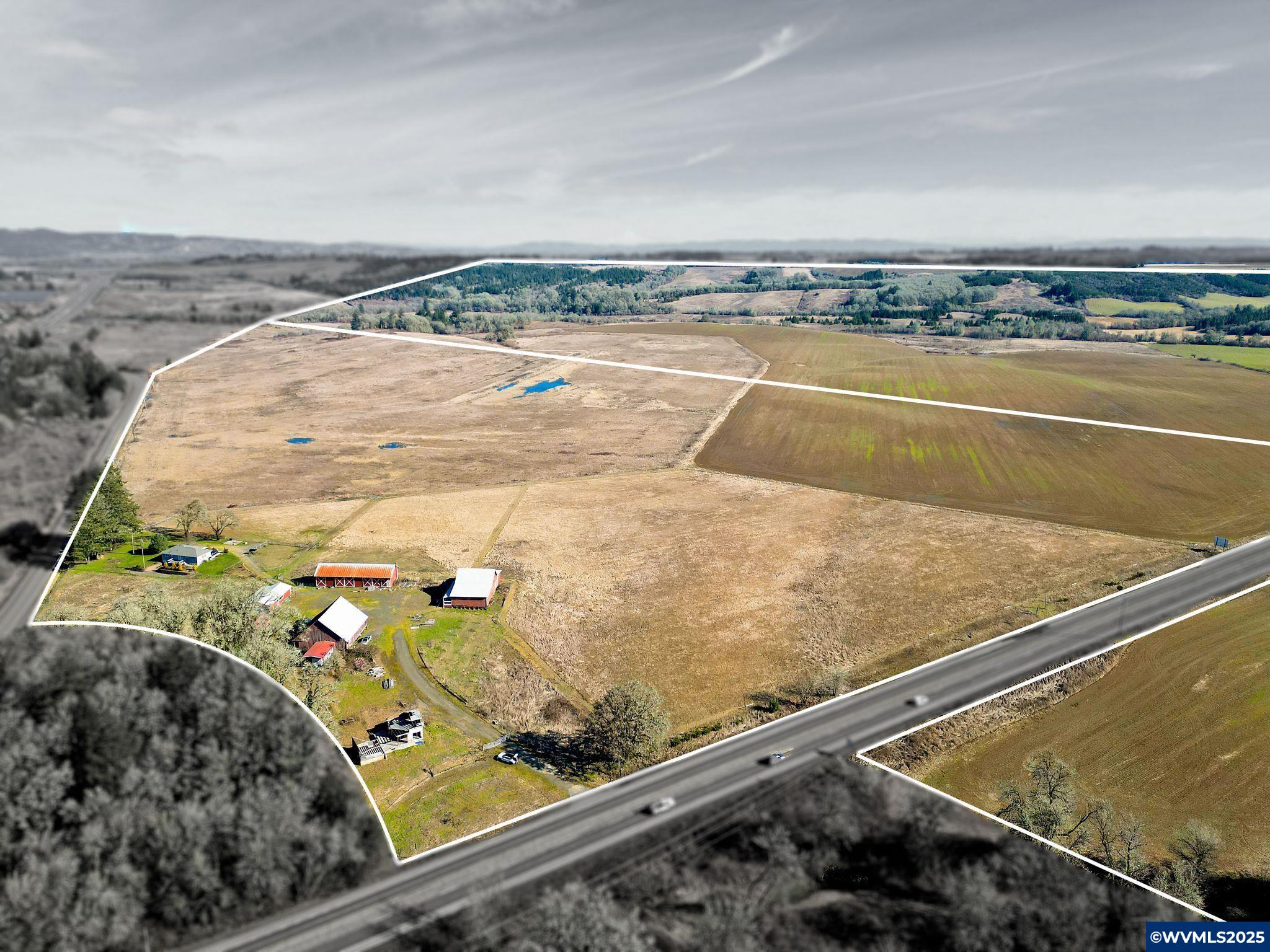 Accepted Offer with Contingencies. Stunning 325-acre property with sweeping valley views & a natural spring. Live in the remodeled 1,500 sqft home while building your dream home on the second site using existing plans or creating your own. 2 wells on-site w/ available Red Prairie water hookup. First home includes a fully finished basement w/ separate access, dog washing station, & 1-car garage. Each home site has its own driveway. Outbuildings: farm stand-ready barn, animal pen barn, shed/horse barn, hay barn, & chicken coop—all with power. Previous Polk County approval for distillery/tasting room. Income potential: Airbnb, farm stand, livestock, ag lease, or equestrian development. Conservation easement on approx 183 acres, apple, pear, & cherry trees, blueberries, grapes, raised garden beds w/ irrigation. Property eligible for two Bull Elk Tags (8 month hunt) through ODFW Lop Program—an elk hunter’s dream!