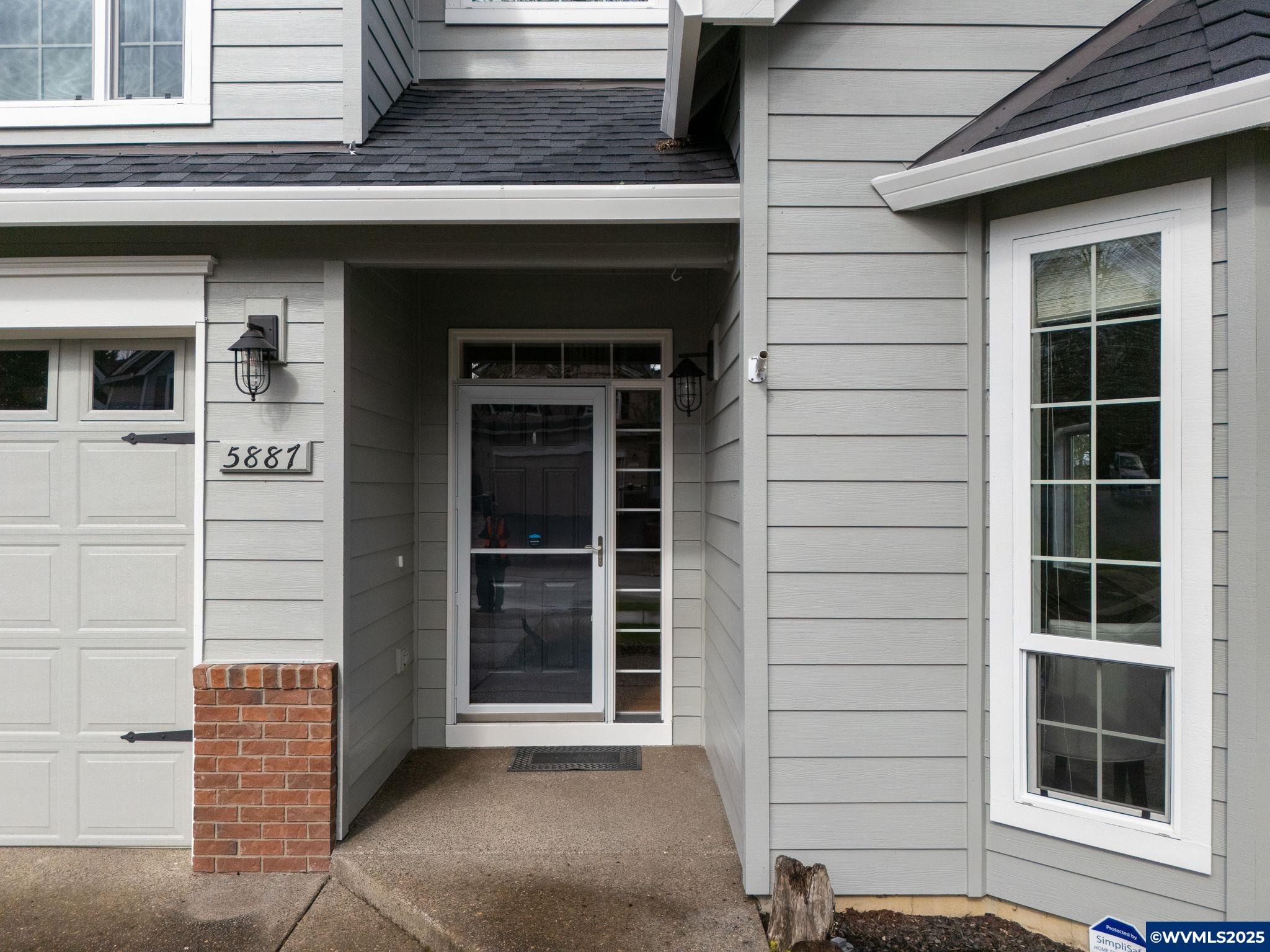 5887 SW Delwood Av