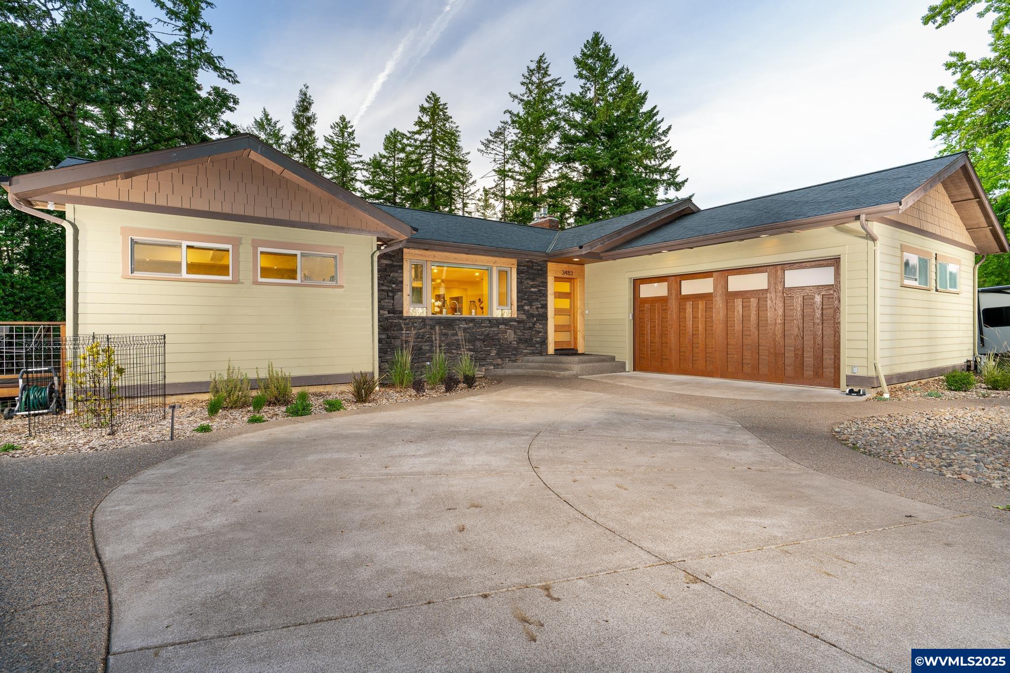 Tucked away on nearly half an acre in town and backing to a tranquil meadow green space. Serene views bring nature to your doorstep. Beautiful open-concept main floor with large windows, skylights, and exposed beams. Downstairs offers flexible space with multi-generational living potential, ideal for extended family or guests. Outside enjoy three spacious decks, a custom paver medallion patio, and a fenced raised-bed garden.  This is in-town living at its finest.
