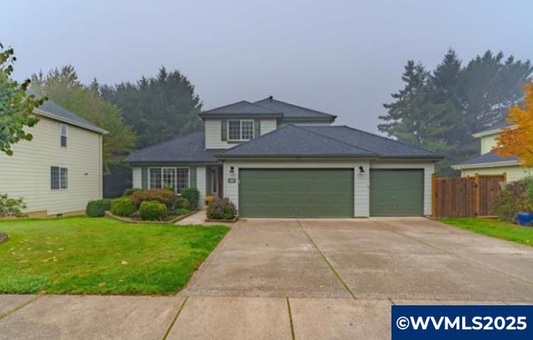 Accepted Offer with Contingencies. Don’t miss this beautiful 3-bd, 2.5-bth home offering 1,934 square feet of comfortable living space! The vaulted living room creates a spacious feel and connects seamlessly to a formal dining area complete with built-in storage. The kitchen is designed for both function and style, featuring granite countertops, a pantry, a built-in desk area, and more. Enjoy cozy evenings in the family room with its inviting gas fireplace. Upstairs, you’ll find the primary suite, two additional bedrooms, and a full  bath. Conveniently located on the main level, the laundry room and mudroom offer practical everyday living. Step outside to a gorgeous backyard deck — the perfect spot for entertaining or soaking in the stunning mountain views.