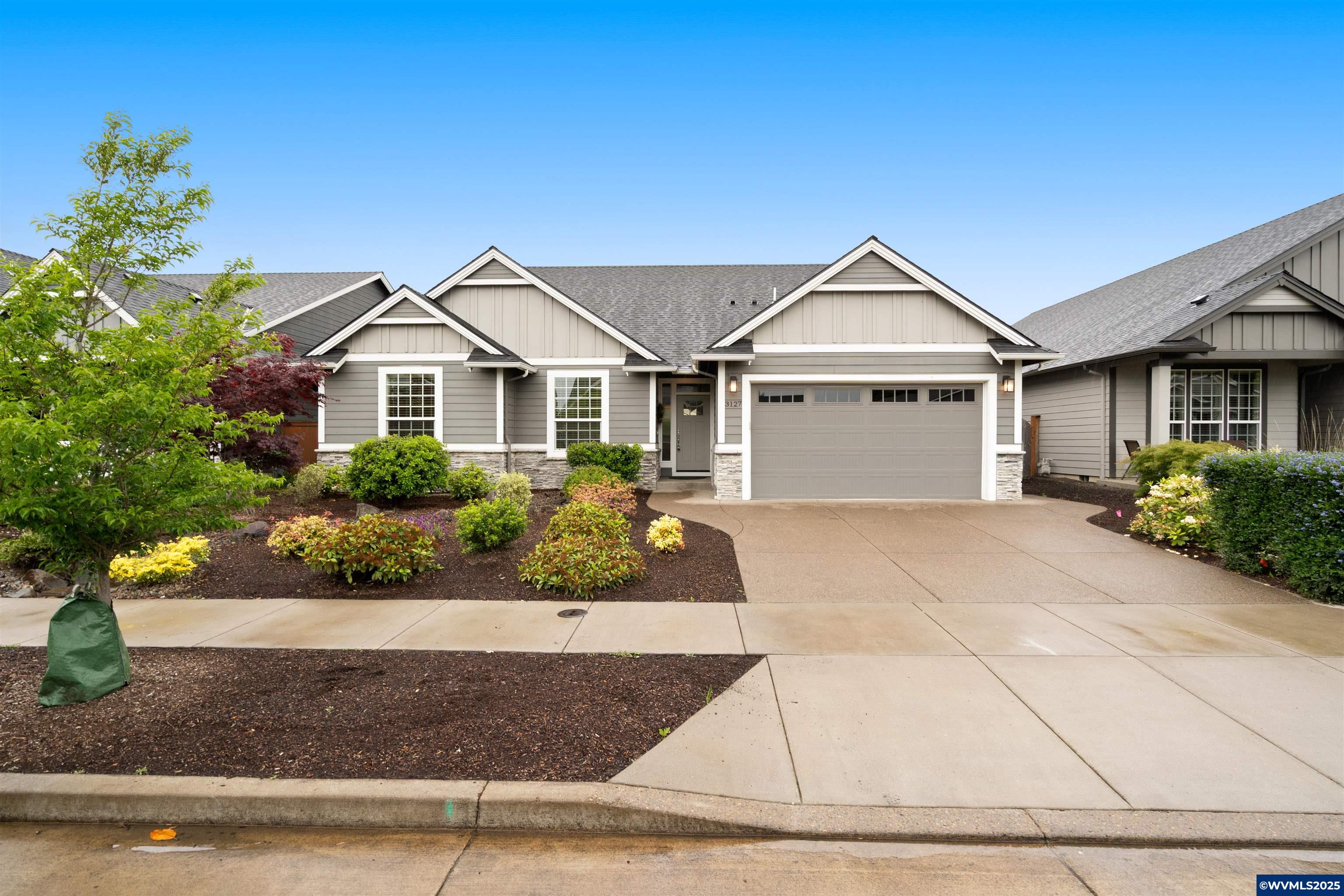 This beautiful built home features abundant custom cabinetry, high ceilings & granite throughout. Open living w large windows open up to beautiful landscaped low-maint yard & covered patio. Island kitchen w stainless steel appliances, gas range & pantry. Downstairs is large utility/mud room, 2 bed, full bath and full Master suite, walk-in closet. Upstairs spacious 1/1 suite w living rm & wet bar. Central A/C!