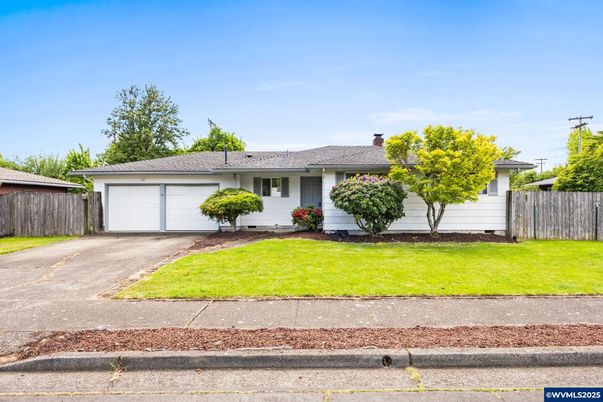 Amazing single level in desired NW Corvallis area convenient to Brandis City Park, bus routes and shopping.  This home offers a covered deck, spacious fenced back yard, and shed with almost 1/4 acre to enjoy! Open kitchen concept with vinyl floor, comfortable carpet in living room & some areas with hardwood floors. Newer water heater, furnace & air conditioning gives confidence of long lasting systems.