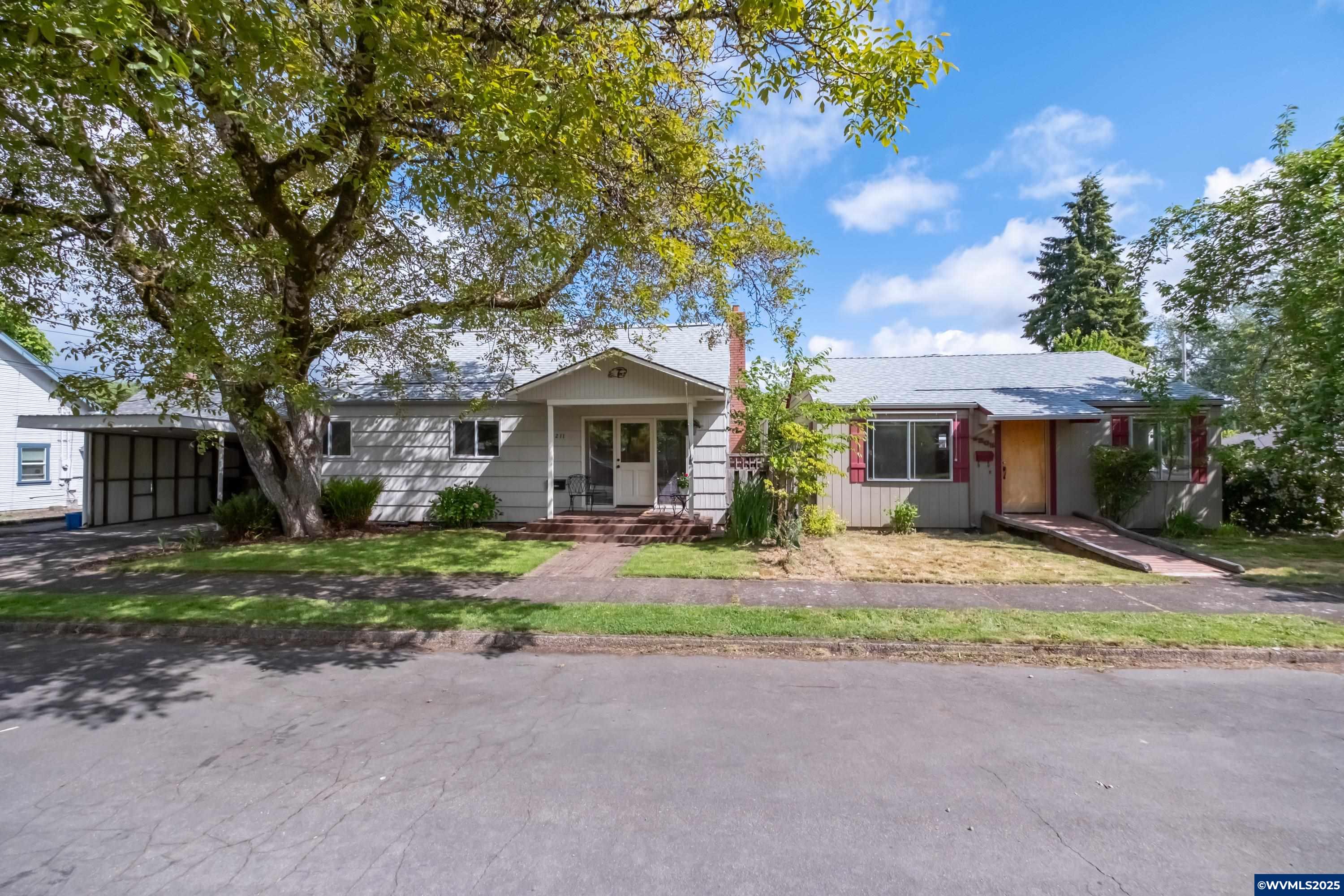 Rare Opportunity – Two Homes on One Lot! Whether you're looking for multi-generational living, investment potential, or a live/rent option, this property delivers flexibility and charm. The homes are centrally located in a convenient, campus close neighborhood. 3205 is a smartly designed, single-level home offering 1 bedroom and 1 bathroom, with ADA-friendly modifications for enhanced accessibility. 3211 is a spacious two-story home featuring 2 bedrooms, 1.5 bathrooms, and a basement workshop. See #829069.