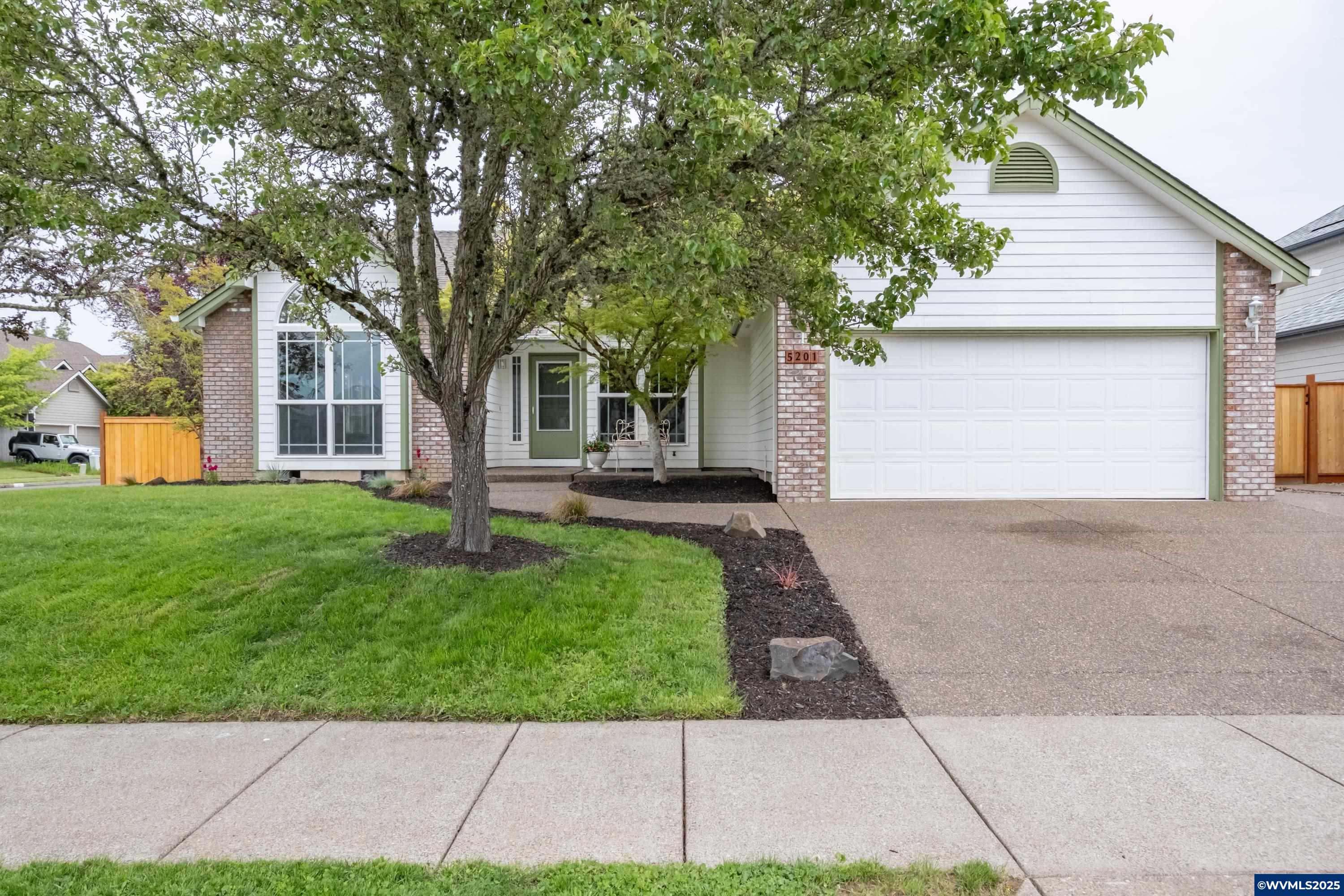 Welcome to the desirable Spring Meadow Subdivision! This charming single-level home is move-in ready & awaits your new beginnings. Wether you're enjoying the Summer warmth on the back deck or snuggled up to the gas fireplace in the Winter, you're sure to feel right at home. With all new flooring, fresh interior paint, new stainless Gas range, dishwasher, microwave & so much more. Primary bedroom is equipped w/ Vaulted ceilings, walk-in closet & dual vanities. Enjoy the walking paths & Doug Killin Park!