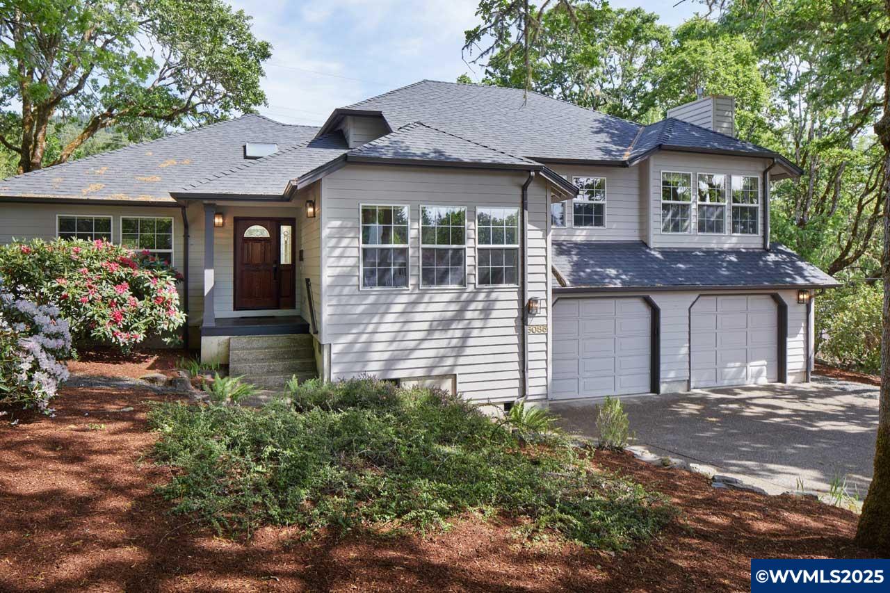 Remarkable residence up against urban growth boundary and main entrance to Skyline West. Original owners have kept this in gorgeous, pampered condition. Several living levels but only a few steps apart except down to laundry room and garage/shop area. All bedrooms including the primary bedroom on main level. Primary has sitting area and spacious bath. Beautiful refinished HWD floors in traffic areas. Formal dining room with built ins overlooks the living room below. Wonderful cooks dream kitchen and adjacent family room.  Vaulted ceilings and many built in book cases. Near bike and hiking paths. Beautiful treed and lushly landscaped grounds. Nature abounds! Workshop/storage area between utility room and spacious garage.