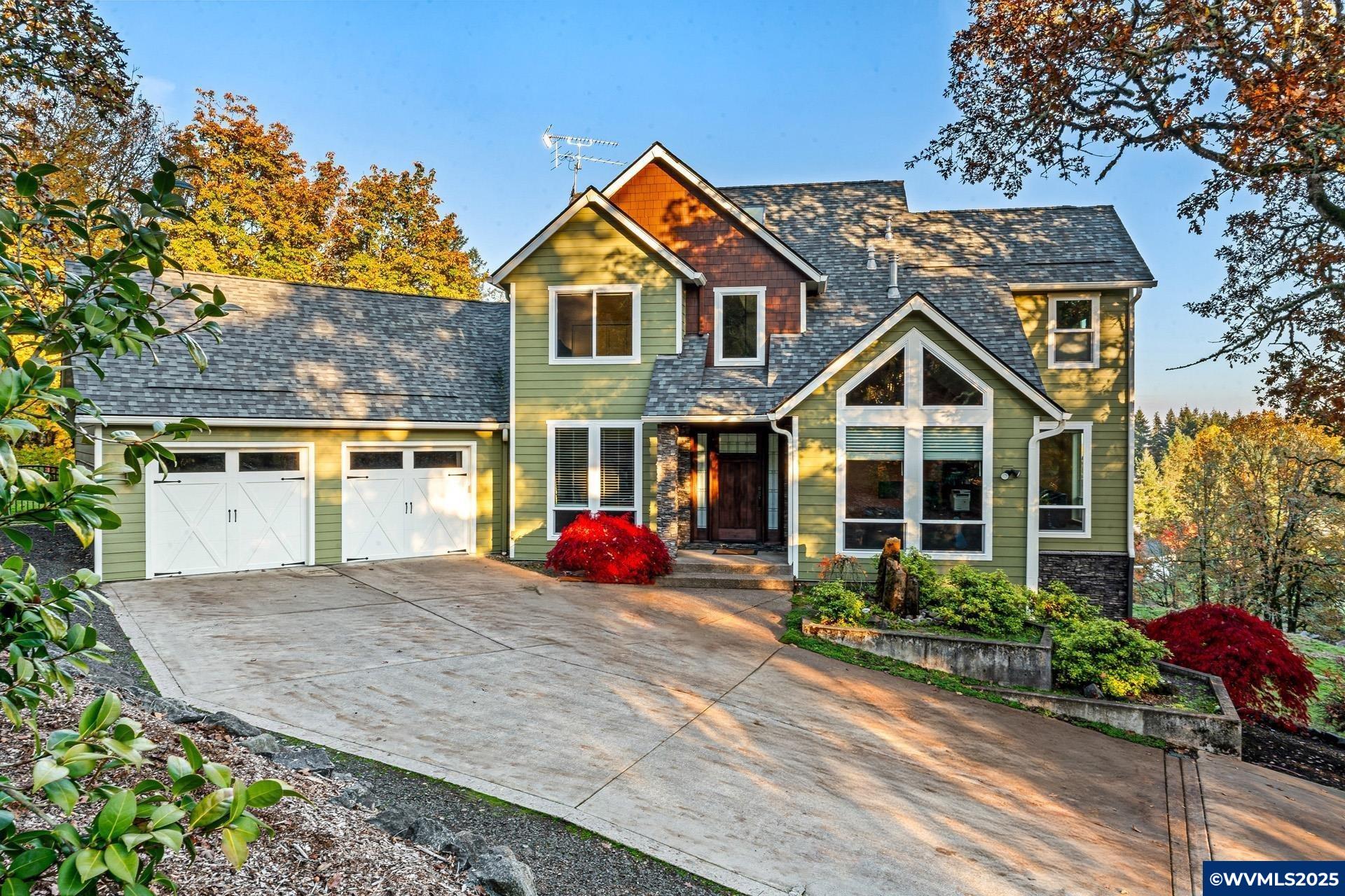Accepted Offer with Contingencies. This Russ Peterson custom home has it all! Centrally located just minutes to Corvallis or Downtown Albany. Enjoy your private oasis w/views of the Cascades. This updated kitchen that includes a master chefs cooktop and counter space galore. High ceilings, walls of windows, gas fireplaces on every floor add to this spacious floorplan. Entertain guests downstairs complete with kitchenette, reading nook, and secret storage in the staircase. The detached garage has plenty of space for any hobbiest. Visit today!